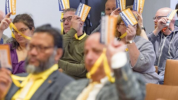 Members voting at Conference